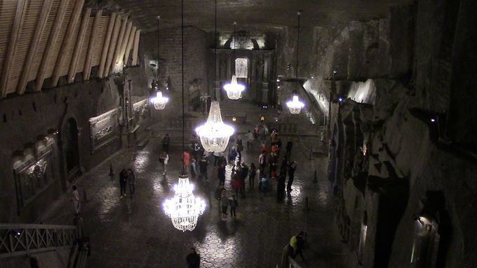 Looking down into a vast cavern, lit by numerous salt crystal chandaliers. Floors, walls, ceilings are all salt. 90% pure salt, 10% impurities.