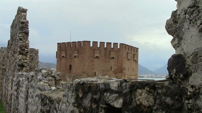 The red tower Alanya seen from fortification up the hill