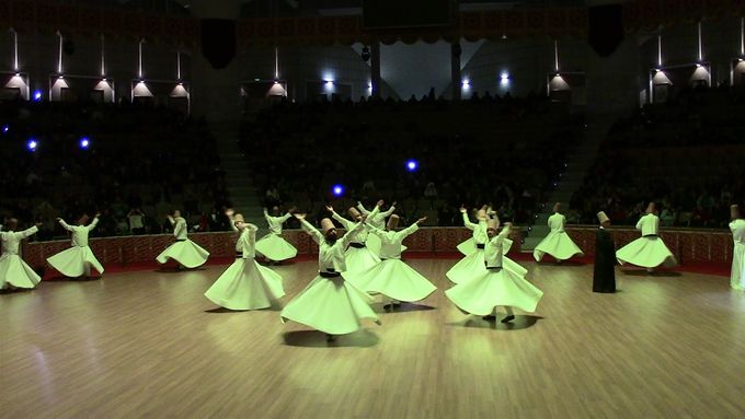 Whirling Dervishes (note the Sheikh observing)