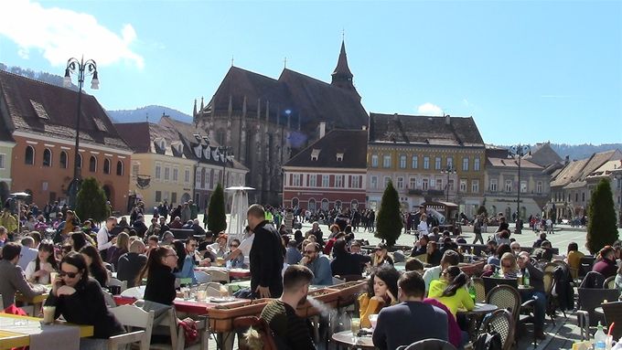 Cafe culture in Council Square. Black church in the background.